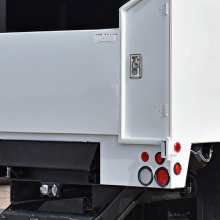 Rear tailgate and ladder box for chip body