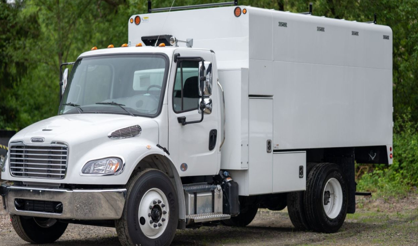 Empty chip truck following a dump run